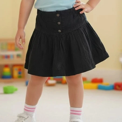 Jupe en velour noir marque Kids nai taille 5 ans